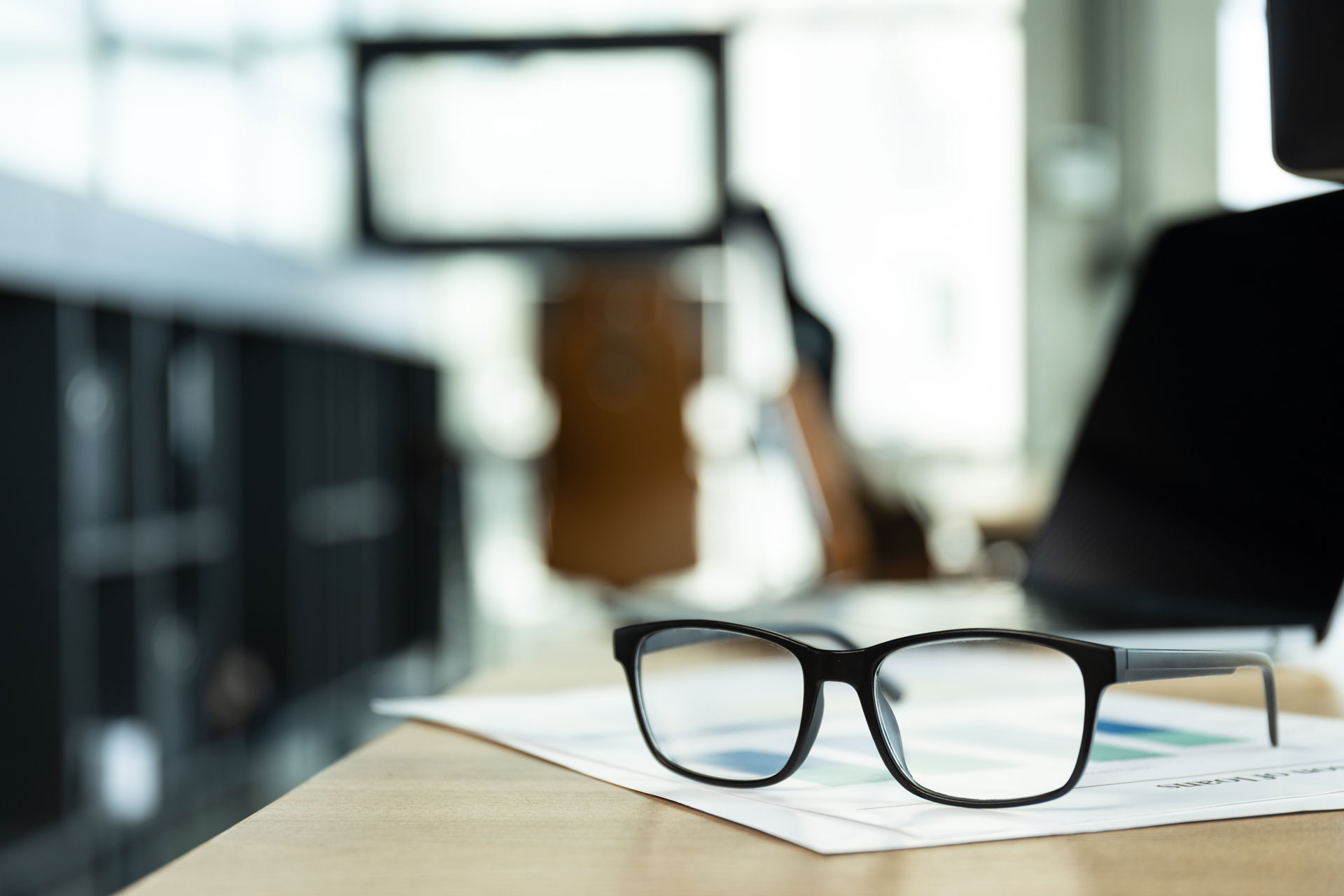 glasses lying on papers in office work in office 2026 01 09 07 14 26 utc